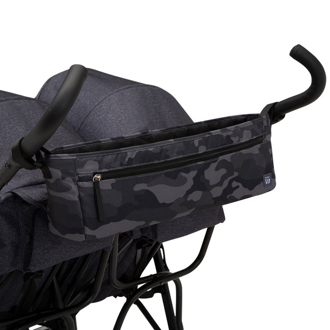 Stroller with a dark blue camouflage bag attached to the handle on a white background 11-babyGap Classic Side-by-Side Double Stroller
