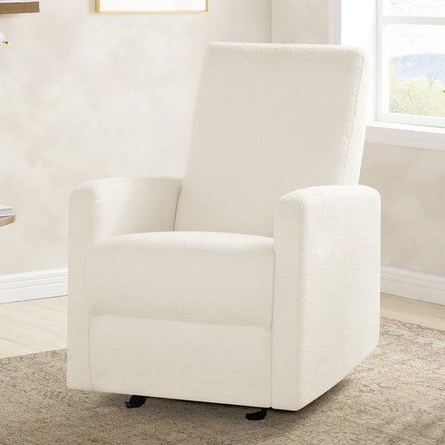 White recliner chair in a room with a window and carpeted floor.