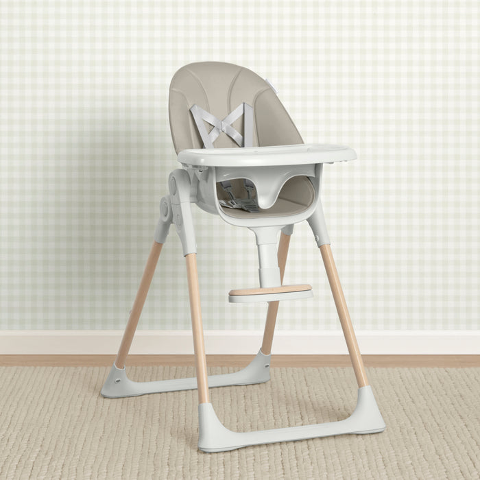 Modern high chair with wooden legs on a neutral background 1-Duet 2-in-1 High Chair and Infant Seat