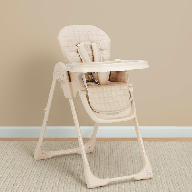 Beige high chair on a beige carpet with a beige wall background 7-babyGap Classic 3-in-1 Convertible High Chair for Babies & Toddlers