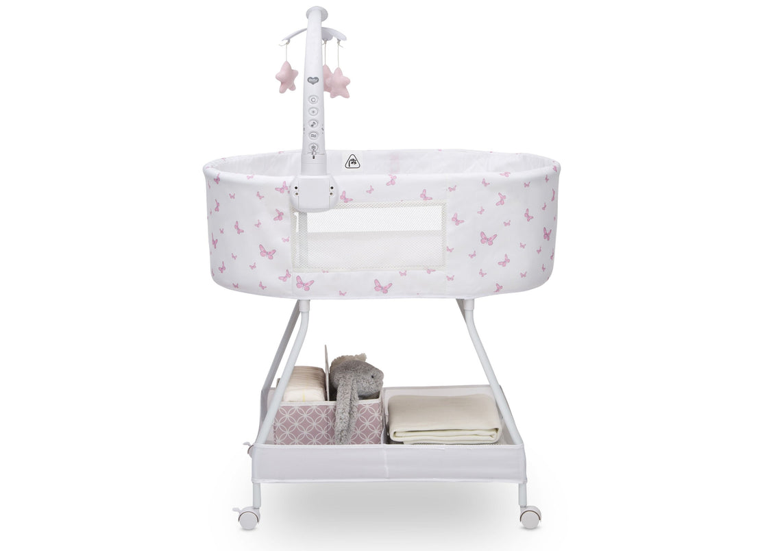 Baby bassinet with pink butterfly pattern on a white background
