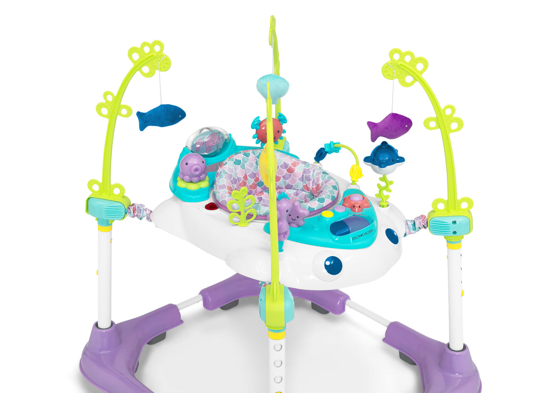 Baby activity center with colorful toys on a white background