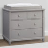 A gray 4 drawer dresser with a changing top pad on top, set against a white background. 9-Belmont 4 Drawer Dresser with Changing Top