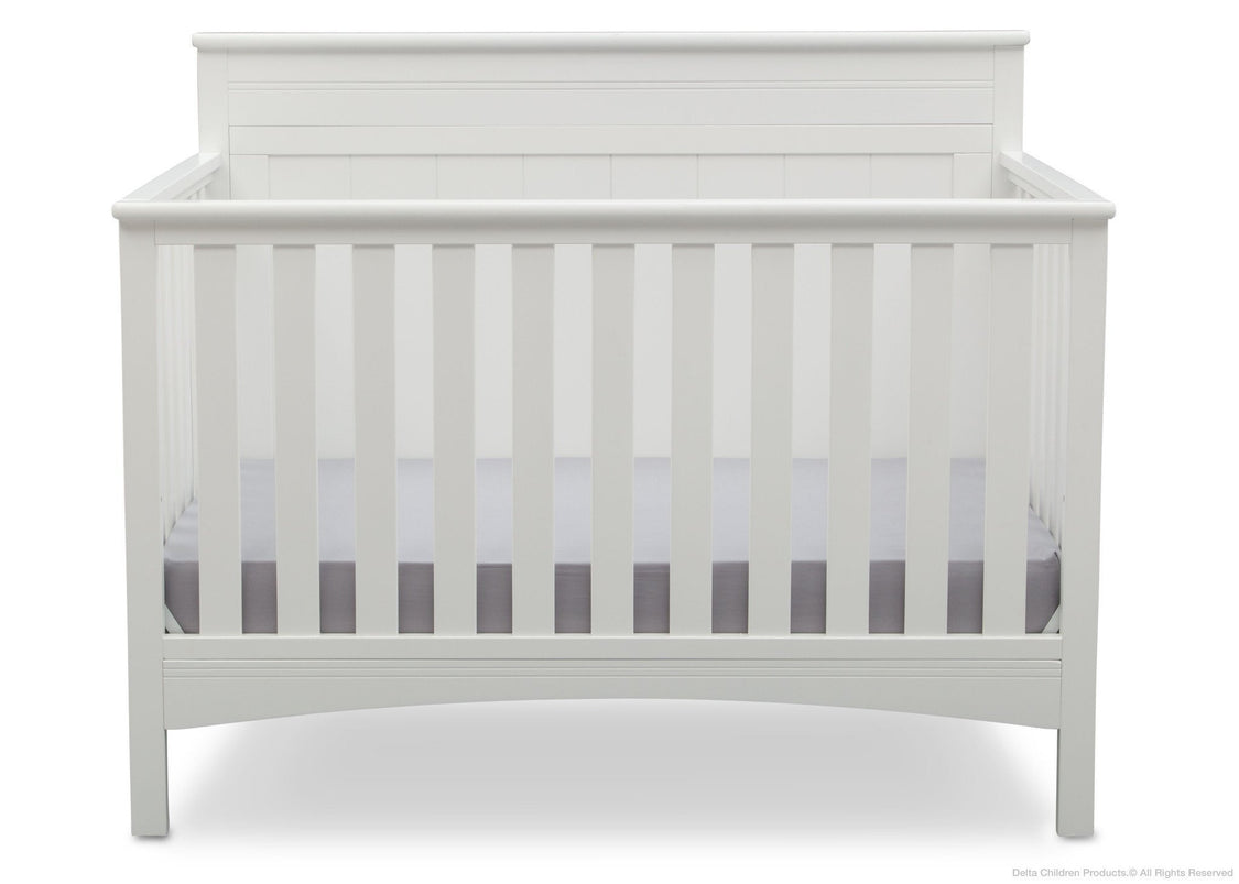 White crib with a gray and white striped mattress on a white background