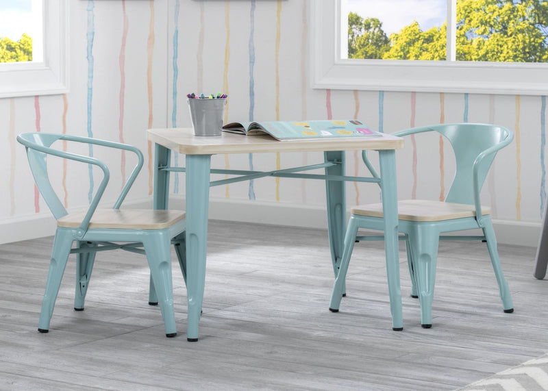 Light blue metal chairs and table with wooden seats in a room with colorful curtains and windows.