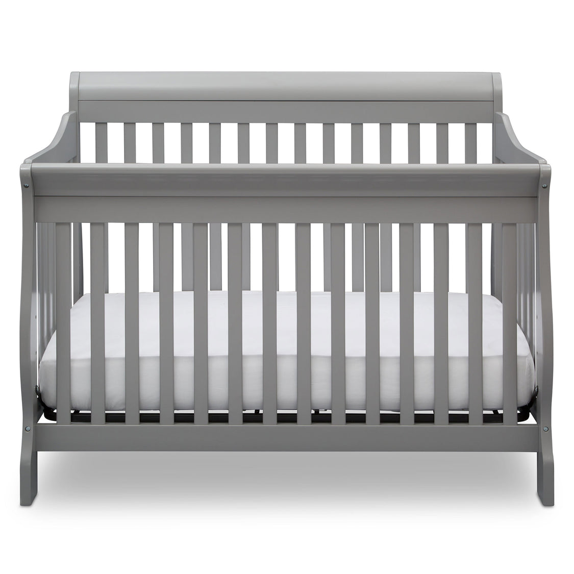Gray crib with a white mattress on a white background