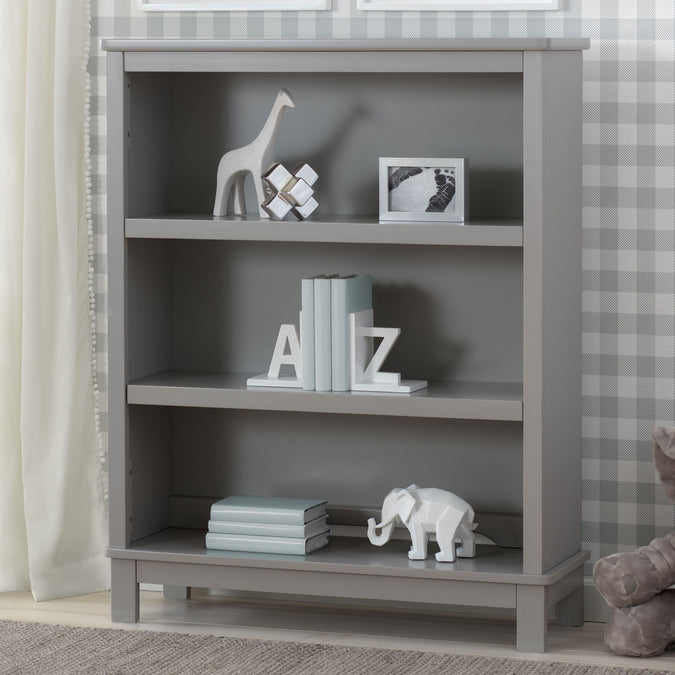 Gray bookshelf with decorative items against a checkered wall. 18-Epic Bookcase