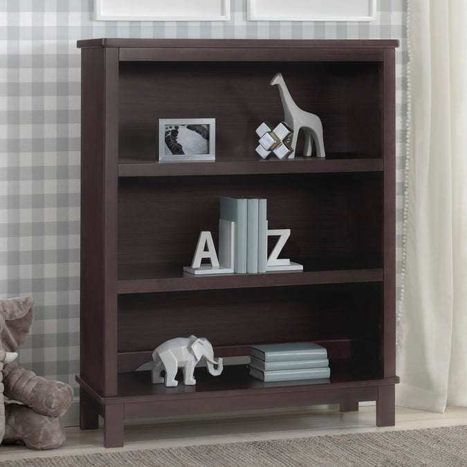 Dark wood bookshelf with decorative items against a checkered wall. 17-Epic Bookcase