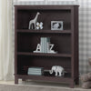 Dark wood bookshelf with decorative items against a striped wall. 11-Epic Bookcase