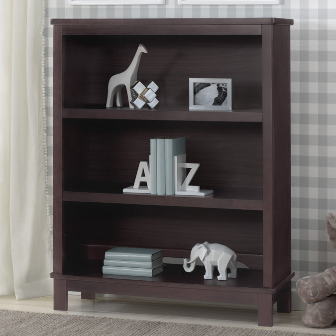 Dark wood bookshelf with decorative items against a striped wall. 11-Epic Bookcase
