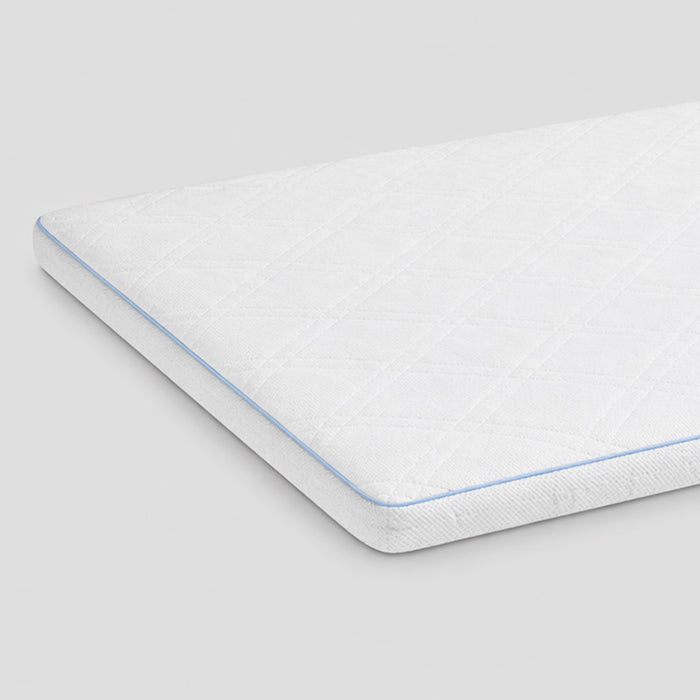 Mattress topper with blue stitching on a light gray background 3-Breeze Breathable Crib Mattress Topper