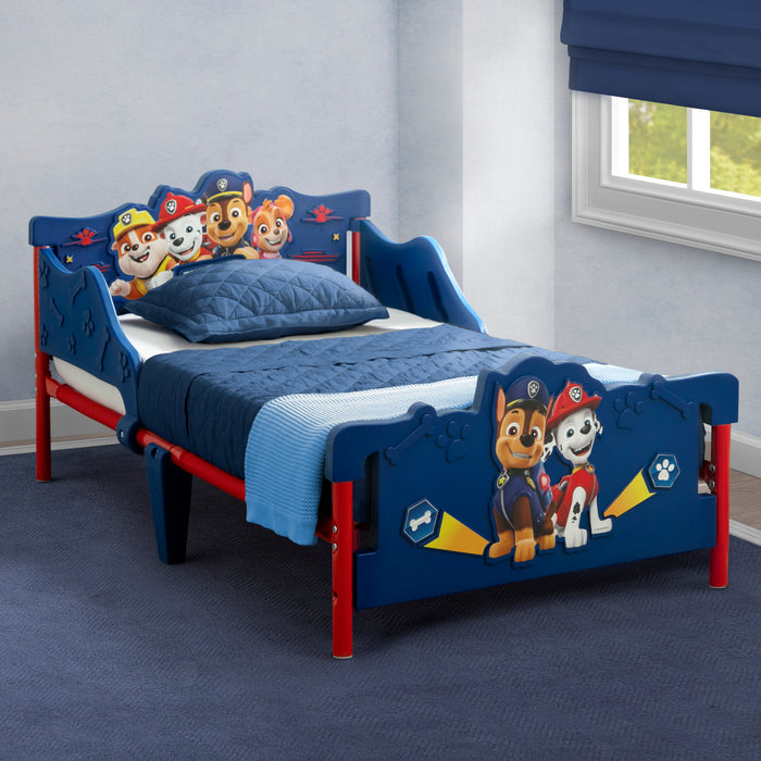 Children's bed with Paw Patrol design in a room with a window. 2-PAW Patrol 3D Toddler Bed