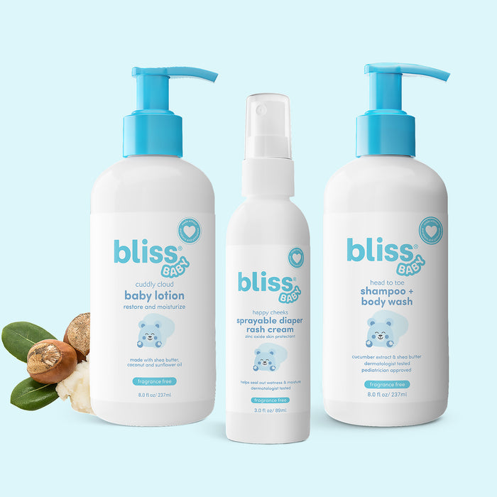 Three bottles of bliss BABY products on a light blue background 0-Baby Care Essentials - Gift Set