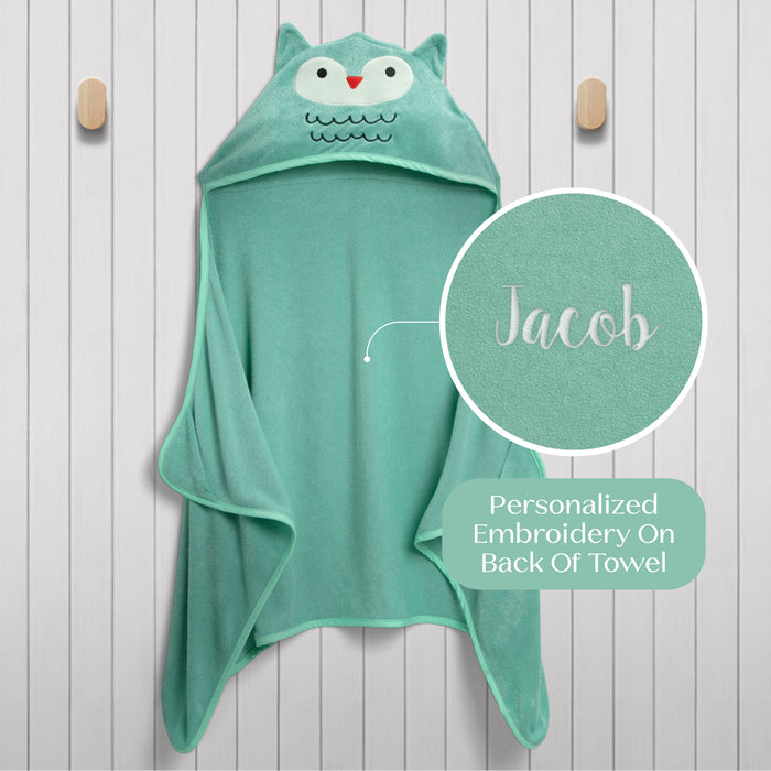 Green hooded towel with owl design and personalized embroidery on a wooden background 0-Personalized Kids Hooded Bath Towel with Pockets
