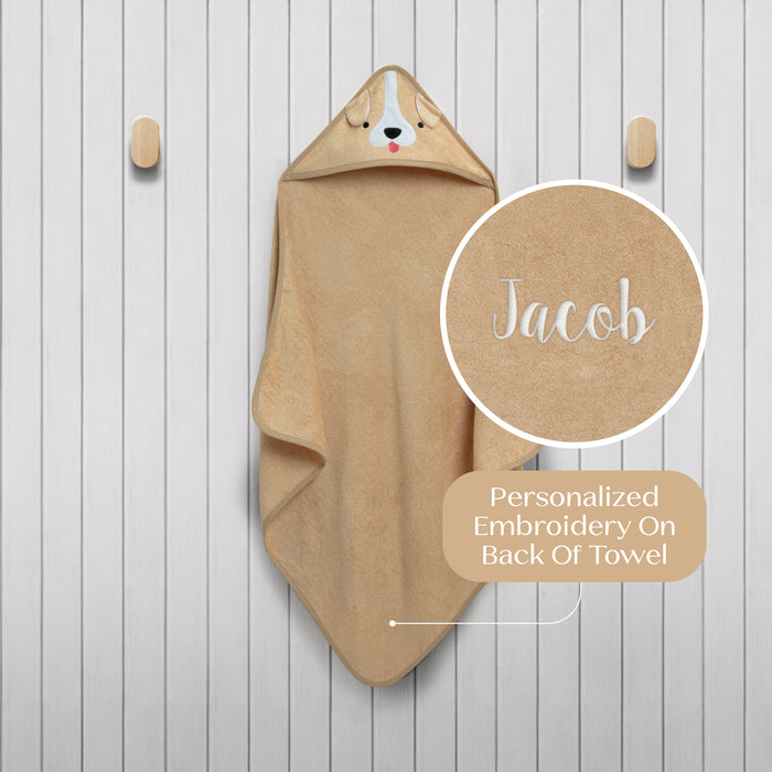 Beige hooded towel with dog face design and personalized embroidery on a wooden background 0-Personalized Baby Hooded Bath Towel