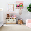 Children's room with storage unit, toys, and decor elements. 37-Brannan Bear Bookcase with Bins