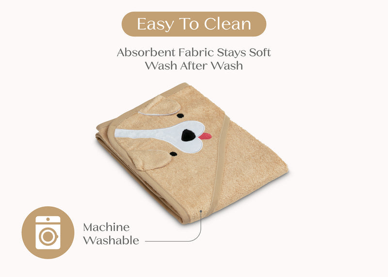 Folded brown towel with a cartoon dog design on a white background, featuring text about its absorbent fabric and machine washability. 35-Baby Hooded Bath Towel