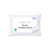 A white Delta Children plush toddler pillow with a large white label on the front, featuring the Delta Children brand name, a green GOTS certification logo, and a circular inset showing the plush texture. 33-Plush Comfort Toddler Pillow
