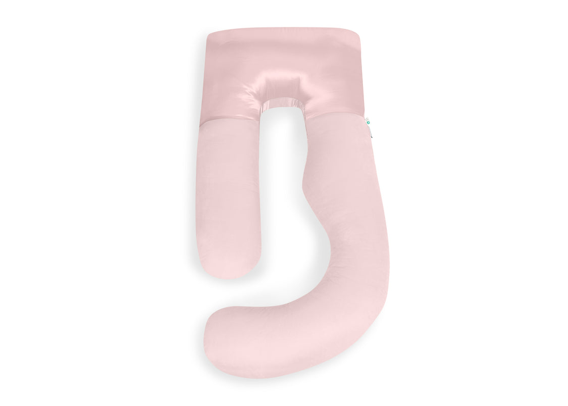 A light pink U-shaped nursing pillow with a satin finish, shown on a solid white background.