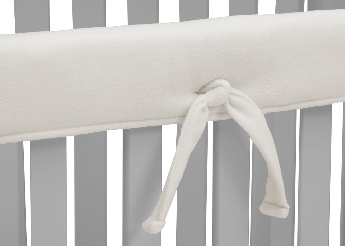 Delta Children Ivory (124) Waterproof Fleece Crib Rail Covers/Protectors for Short Side Rails, 2 Pack, Tie Detail View