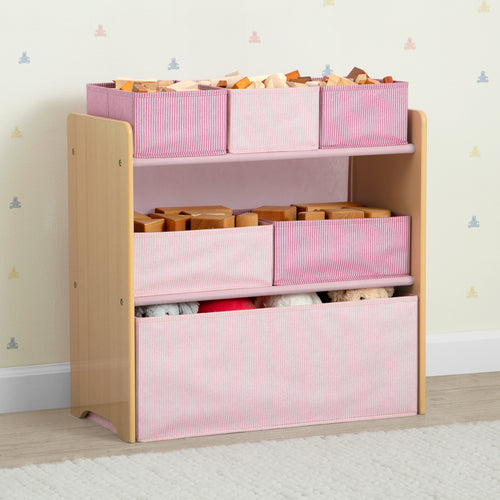 Toy storage unit with pink and white bins containing toys on a light wooden frame.