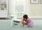 Child playing with a toy storage unit in a bright, child-friendly room. 7-ABC Alphabet Chair Desk with Storage Bin