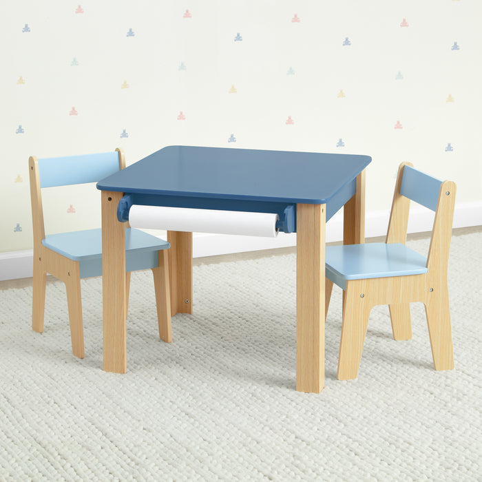 Children's table and chairs set with blue top and wooden legs on a light gray carpet. 2-GapKids Table and 2 Chair Set with Paper Roll Holder