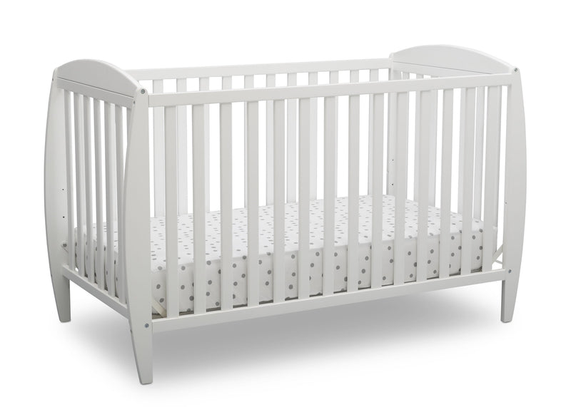 White crib with a mattress on a white background