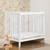 W105550 130 Mia Portable Mini Crib Bianca White Lifestyle 111 31-Mia Portable Folding Mini Crib with 1.5-Inch Mattress
