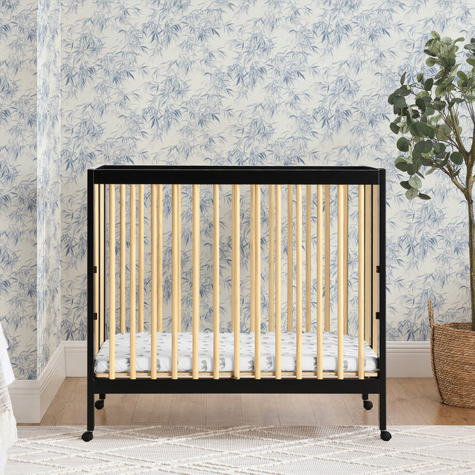 W105550 1482 Mia Portable Mini Crib Black wNatural Lifestyle 117 53-Mia Portable Folding Mini Crib with 1.5-Inch Mattress