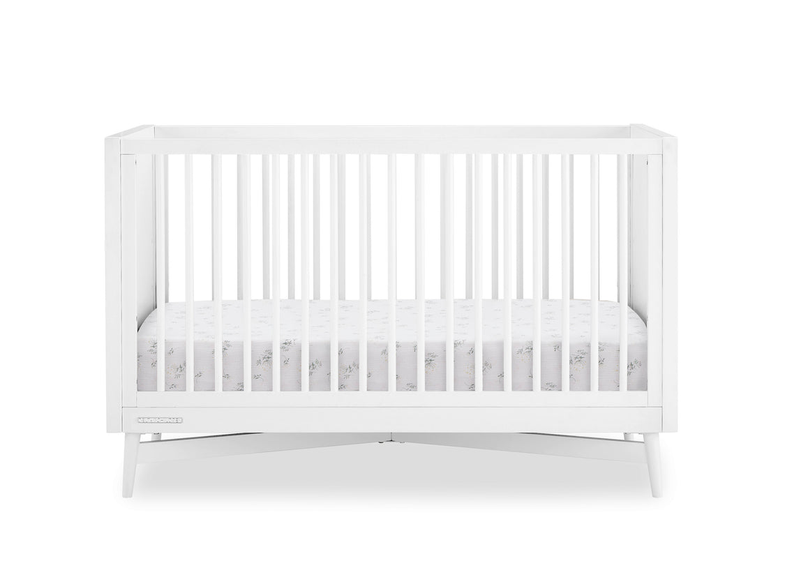 White crib on a white background