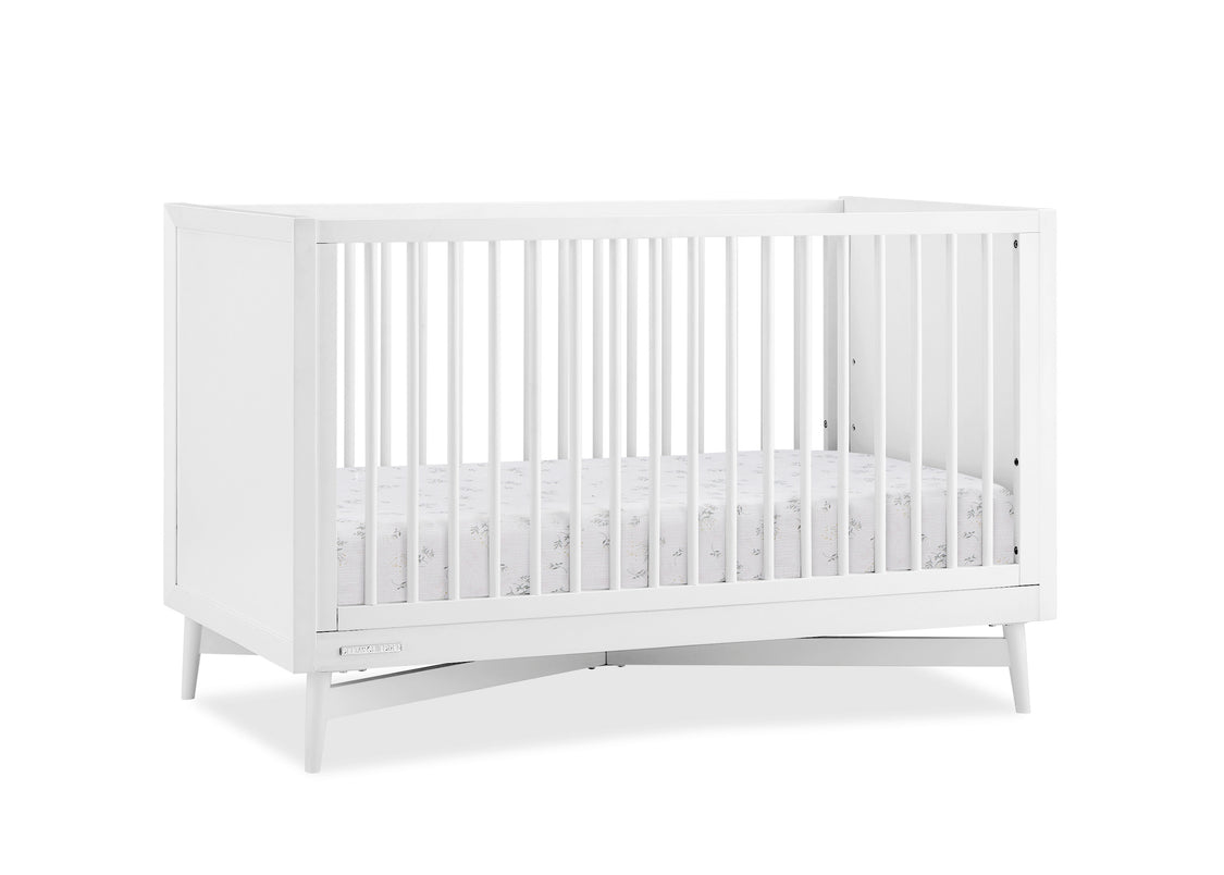 White crib on a white background