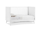 White crib with mattress on a white background 11-Dylan 4-in-1 Convertible Crib