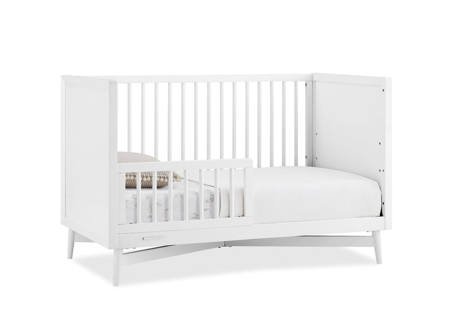 White crib with mattress on a white background 11-Dylan 4-in-1 Convertible Crib