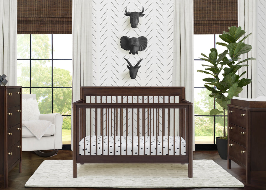 Nursery room with a wooden crib, dresser, and decorative wall art. 23-Remy 6-in-1 Convertible Crib
