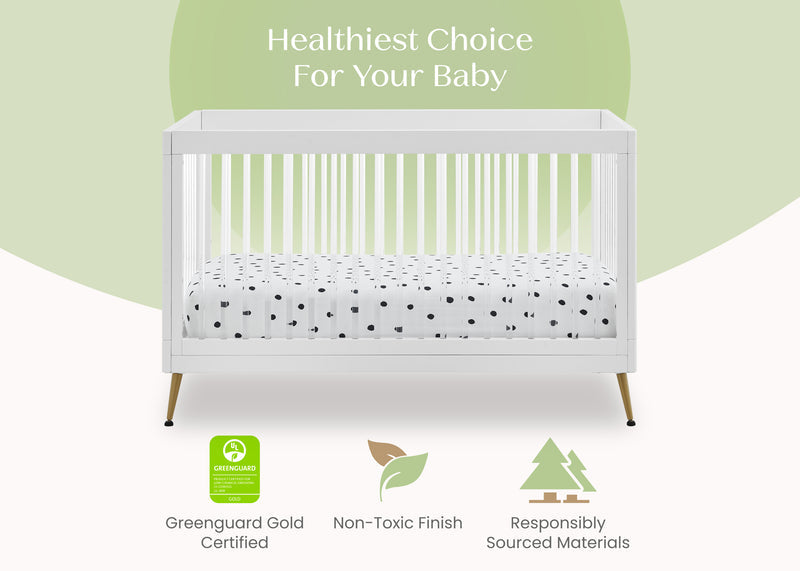 White crib with polka dot mattress on a light green background, featuring certification logos. 17-Sloane 4-in-1 Acrylic Convertible Crib