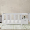 White crib with changing table in a nursery setting 35-Alice 5-in-1 Convertible Crib and Changer