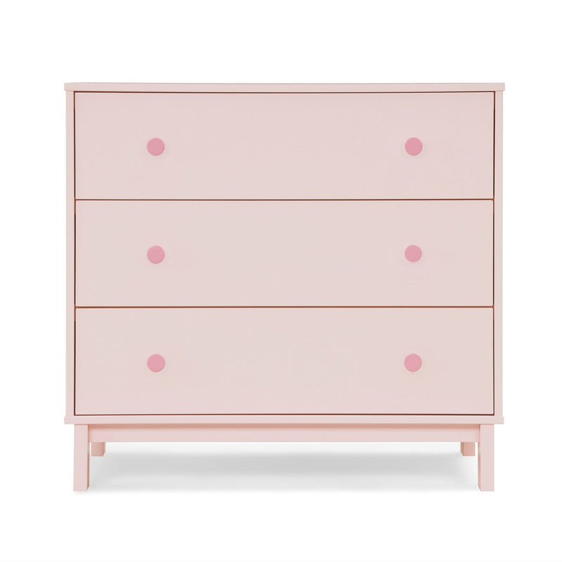 Pink dresser with polka dot accents on a white background