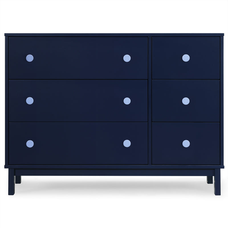 Navy blue dresser with white knobs on a white background