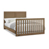 Wooden crib with white bedding on a white background 24-Foundry 6-in-1 Convertible Crib