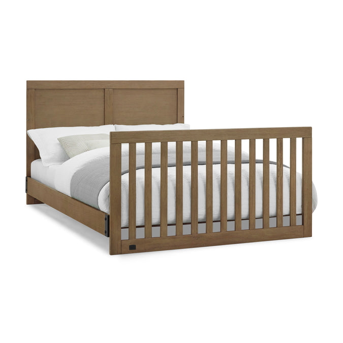 Wooden crib with white bedding on a white background 24-Foundry 6-in-1 Convertible Crib