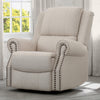 A beige upholstered recliner glider swivel chair with cushioned arms and nailhead trim, positioned in a nursery room. 6-Dylan Nursery Recliner Glider Swivel Chair