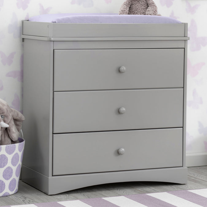 W558430 026 skylar dresser grey lifestyle 104 27-Skylar 3 Drawer Dresser with Changing Top and Interlocking Drawers