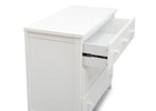 White wooden bed with a drawer open on a white background 21-3 Drawer Dresser with Interlocking Drawers