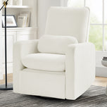 White armchair in a living room setting with a lamp and decor items.