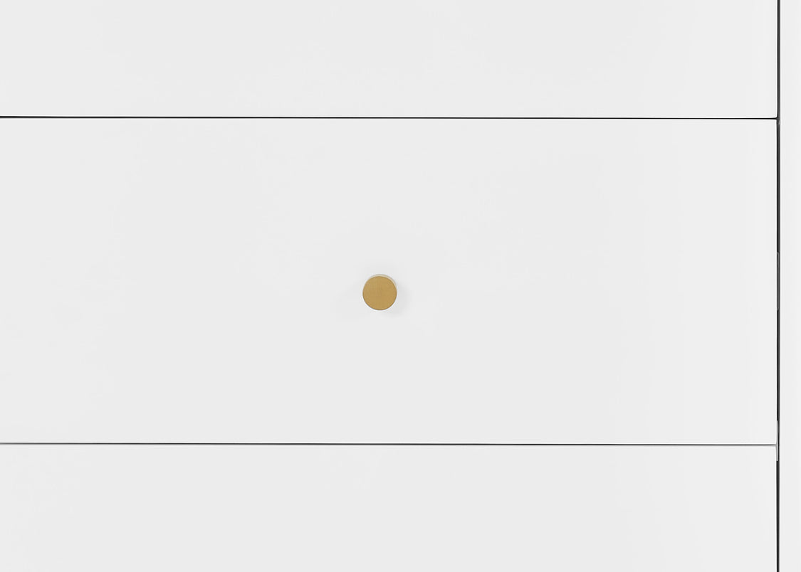 Close-up of a gold circular object on a white background