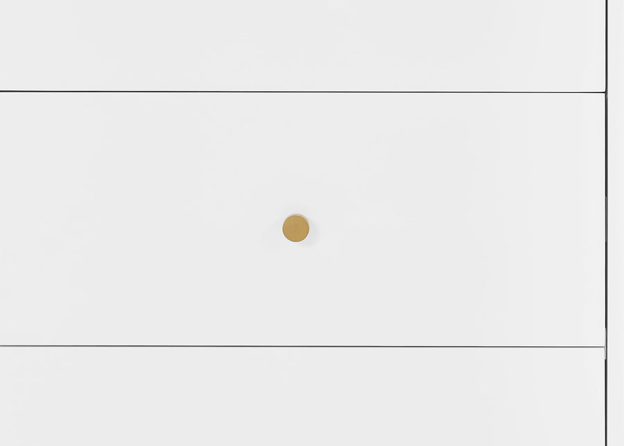 Close-up of a gold circular object on a white background 14-James 6 Drawer Dresser with Interlocking Drawers
