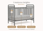 Baby crib with mattress height measurement labels on a white background 23-Darcy 4-in-1 Convertible Metal Crib