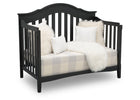 Black crib with white pillows and checkered blanket on a white background 14-Farmhouse 6-in-1 Convertible Baby Crib