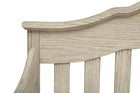 Close-up of a wooden bench with a curved backrest on a white background 13-Farmhouse 6-in-1 Convertible Baby Crib